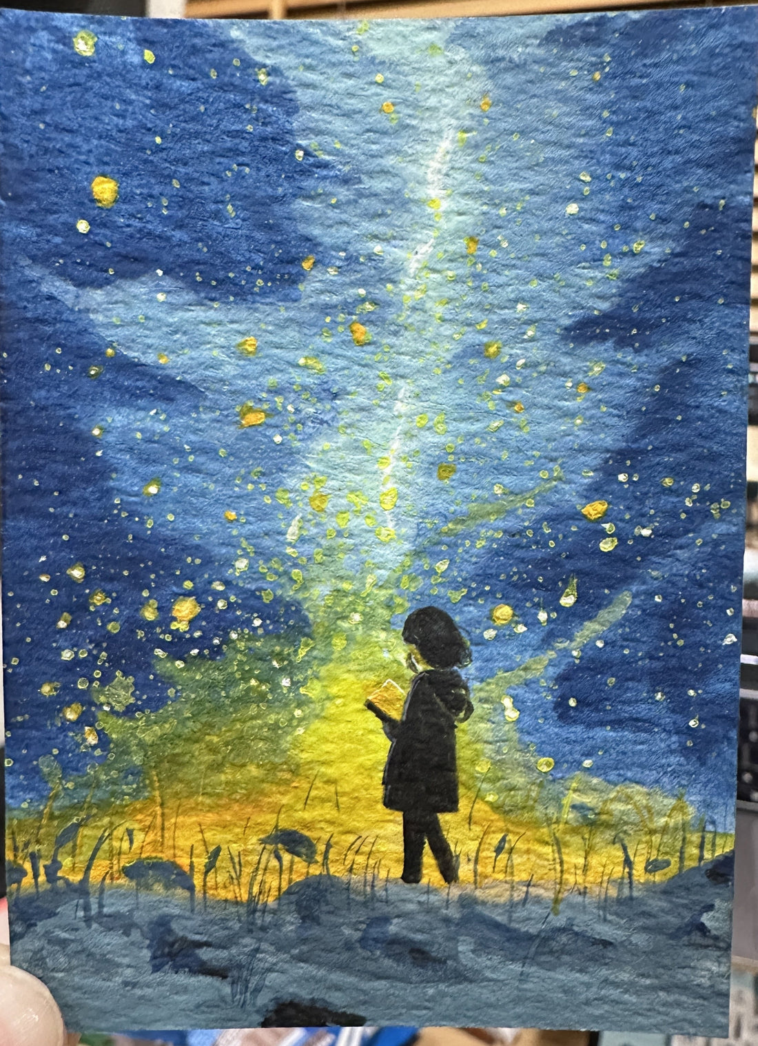 Original ACEO watercolor and gouache painting of a girl reading under a starry sky