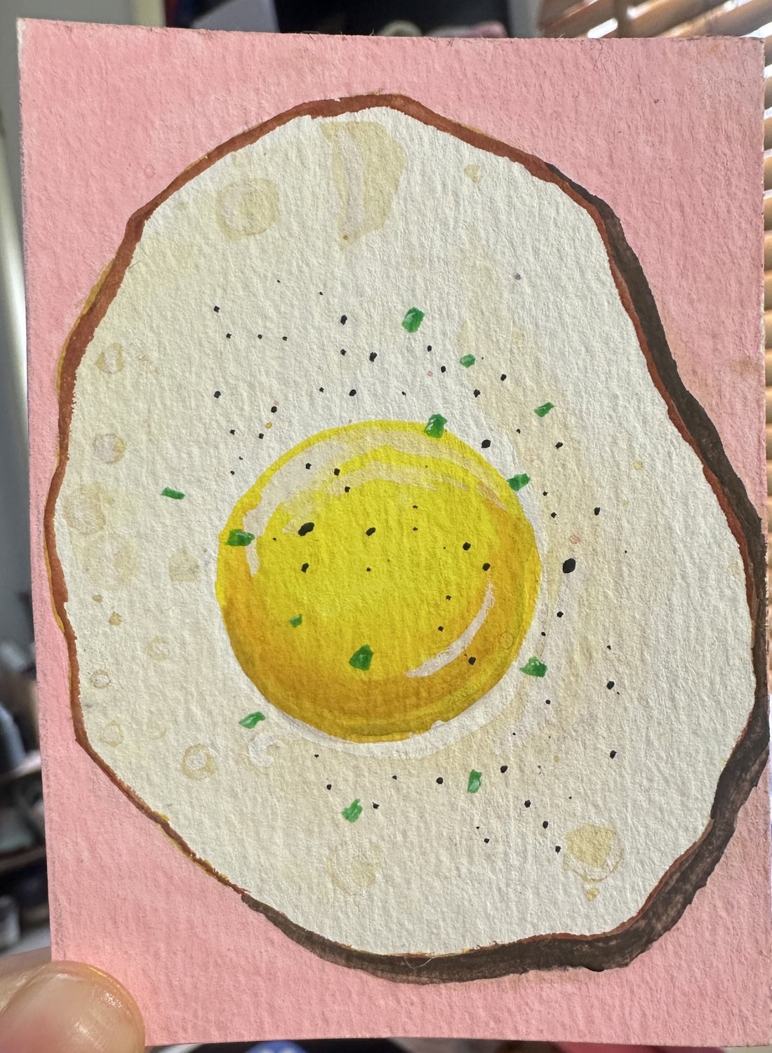Original ACEO watercolor and gouache painting of a fried egg on a pink background