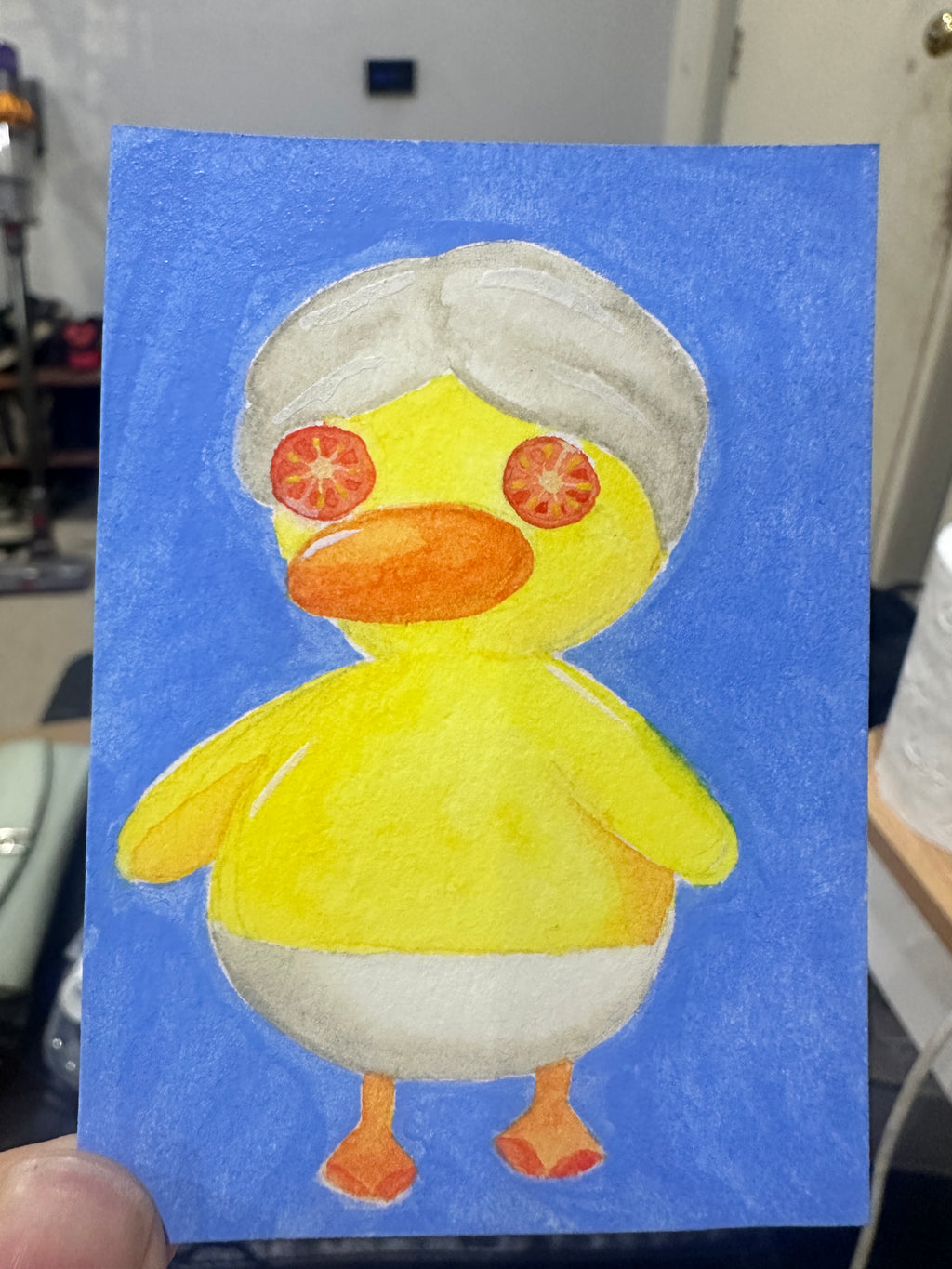 Original ACEO watercolor and gouache painting of a duck at the spa with a towel turban and tomato eye mask, alternate angle
